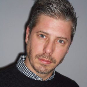 Professional headshot of Phillip Buxton