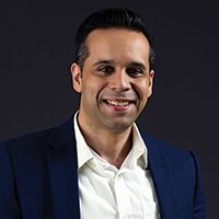 A professional headshot of Kelvin Pichardo