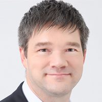 Professional headshot of Nick Kovac