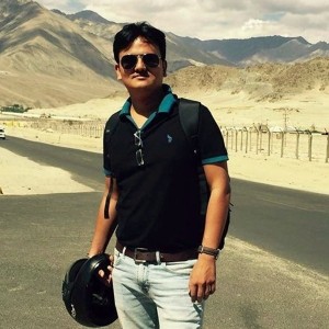 Professional headshot of Raunak Doshi