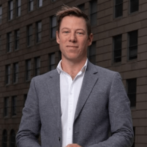 Professional headshot of Cam Dinnie