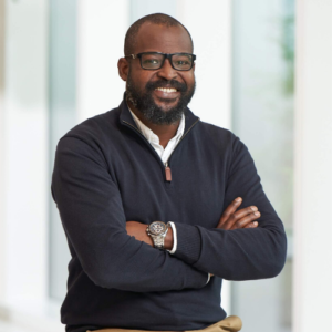 Professional headshot of Babs Kehinde