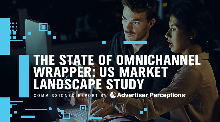 Two adults work in an office and one of them points at the screen. The text 