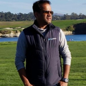 Professional headshot of Gishore K