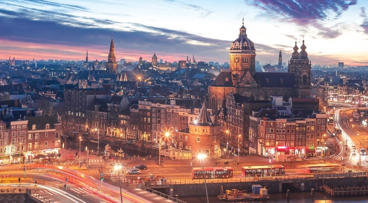 A photo of Amsterdam, Netherlands as the sun sets