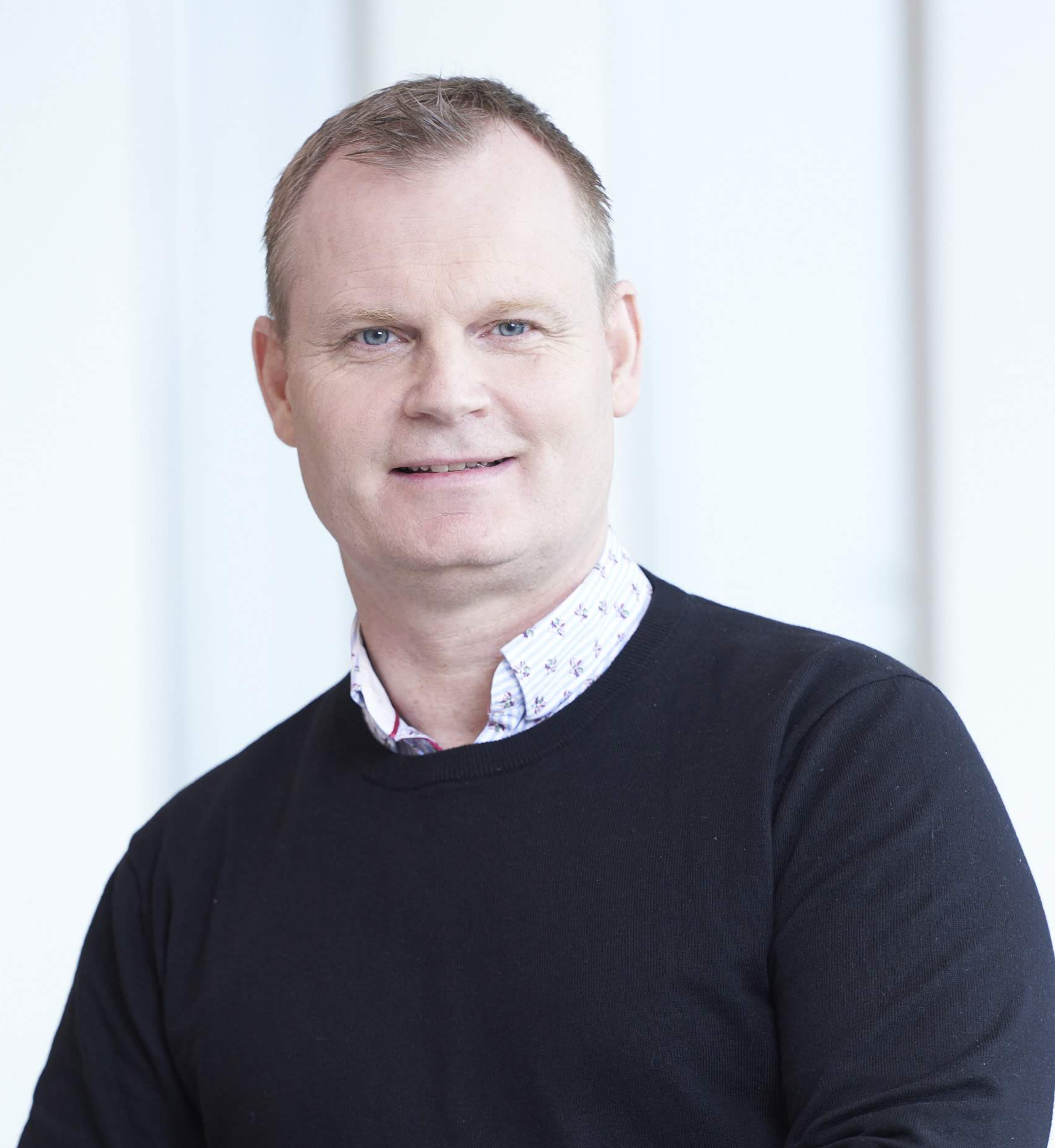 Professional headshot of Thomas Munck