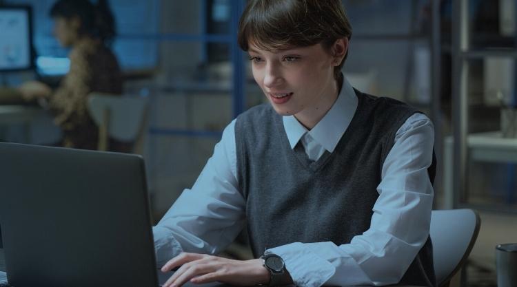 Stylish young person using a laptop computer