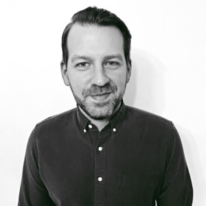 Professional headshot of John Speyer