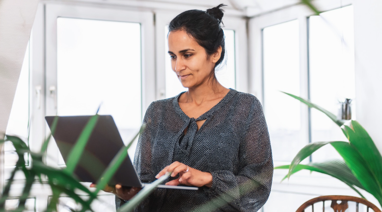 A woman uses her laptop computer