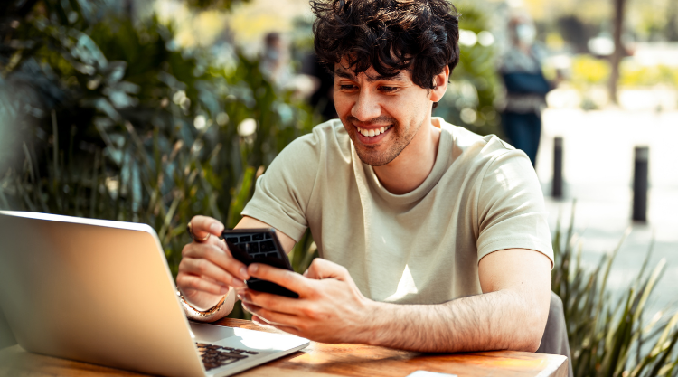 Man on phone scrolling