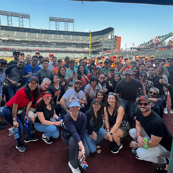 The Redwood City office at a Giants game for their annual summer event.